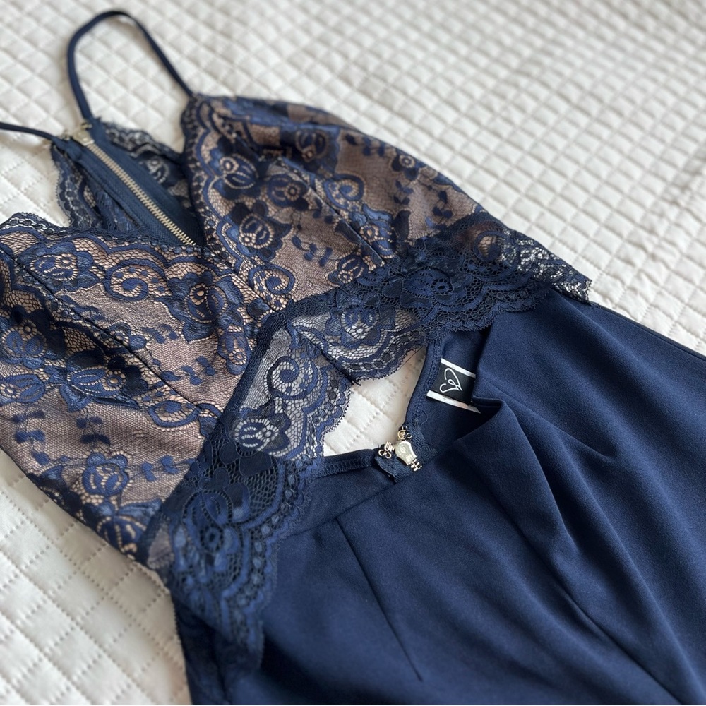 Size M medium Navy blue and lace pants romper. Spaghetti strap. Only worn once.